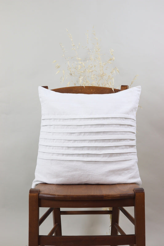 Cushion with pleats